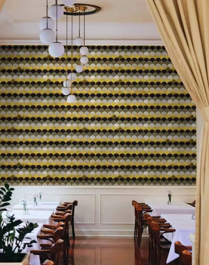 Trend Infinite Scales mosaic feature wall in a restaurant interior